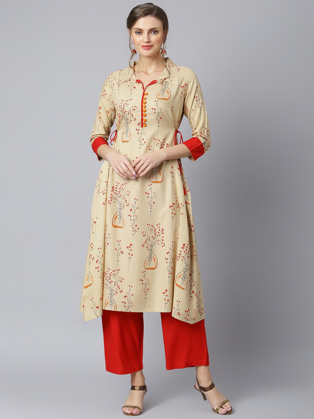 

Khushal K Women Beige Floral Printed Kurta with Palazzos