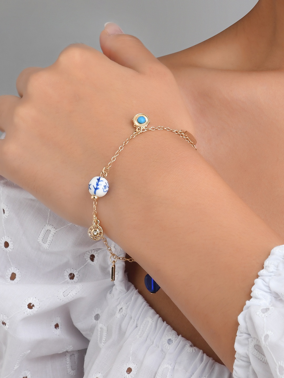 

ToniQ Women Gold-Plated Charm Bracelet