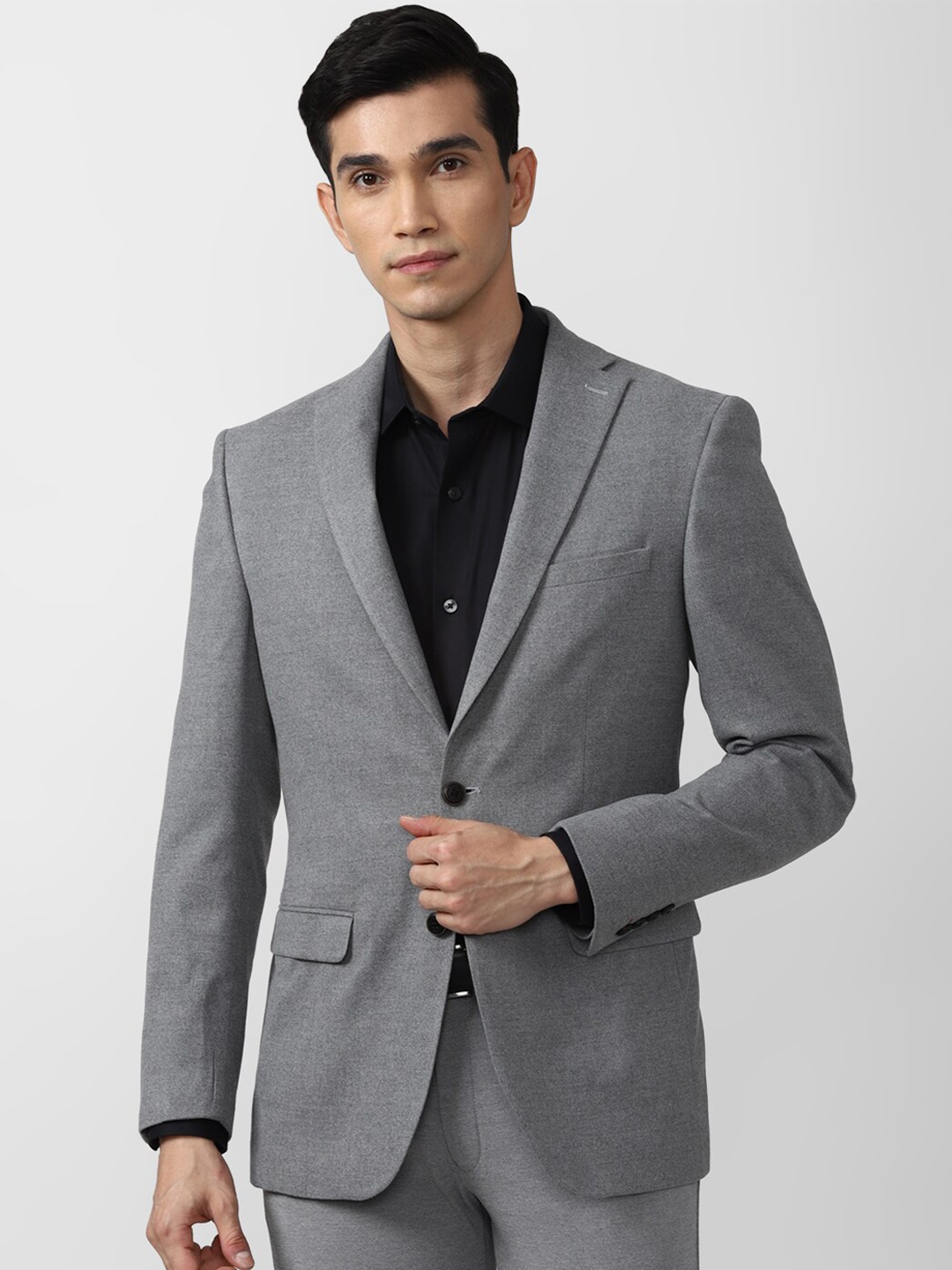 

Peter England Elite Men Grey Solid Single Breasted Blazer