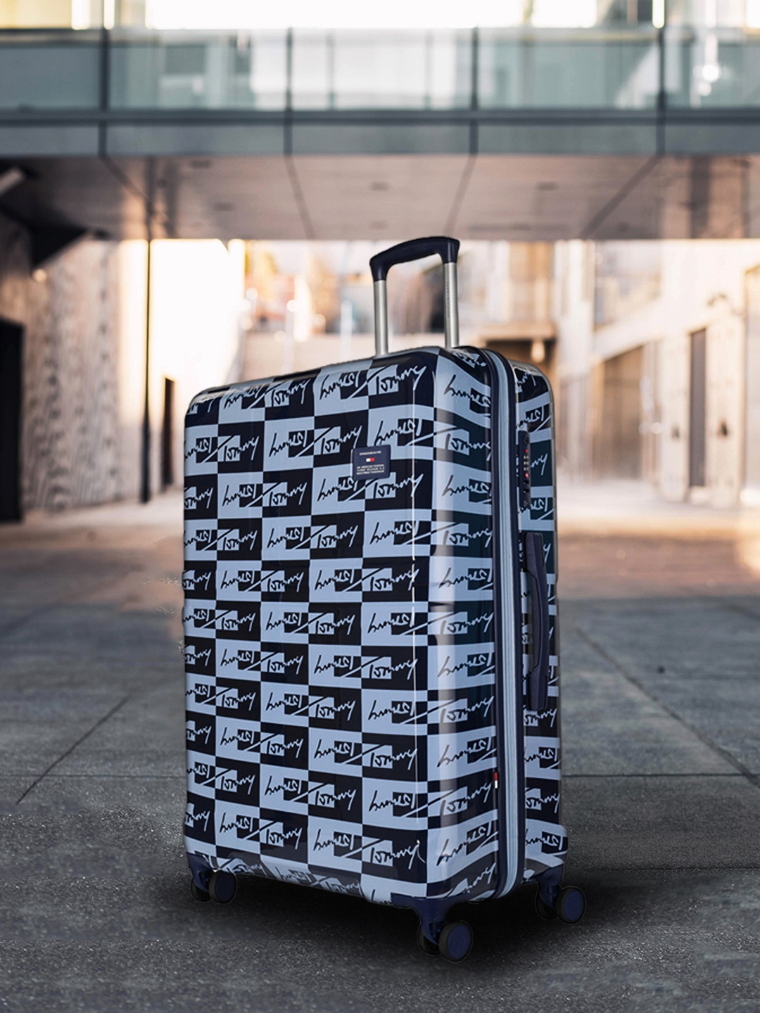 

Tommy Hilfiger Printed Hard 4 Wheels 360-Degree Rotation Large Trolley Bag, Blue