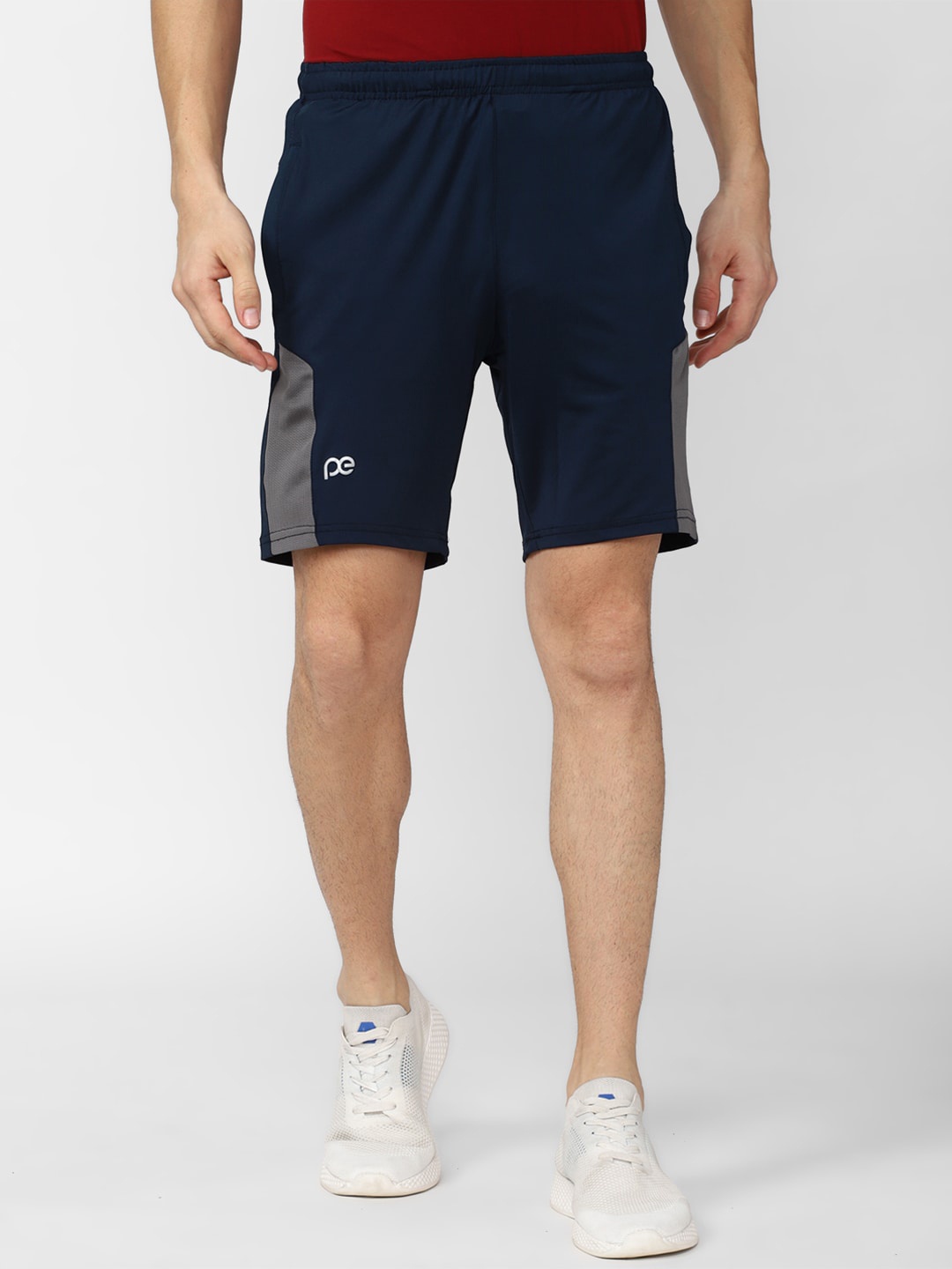 

Peter England Casuals Men Solid Slim Fit Sports Shorts, Navy blue