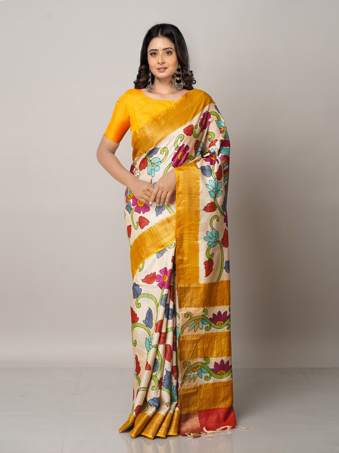 

Unnati Silks Cream-Coloured & Yellow Floral Zari Pure Silk Tussar Saree