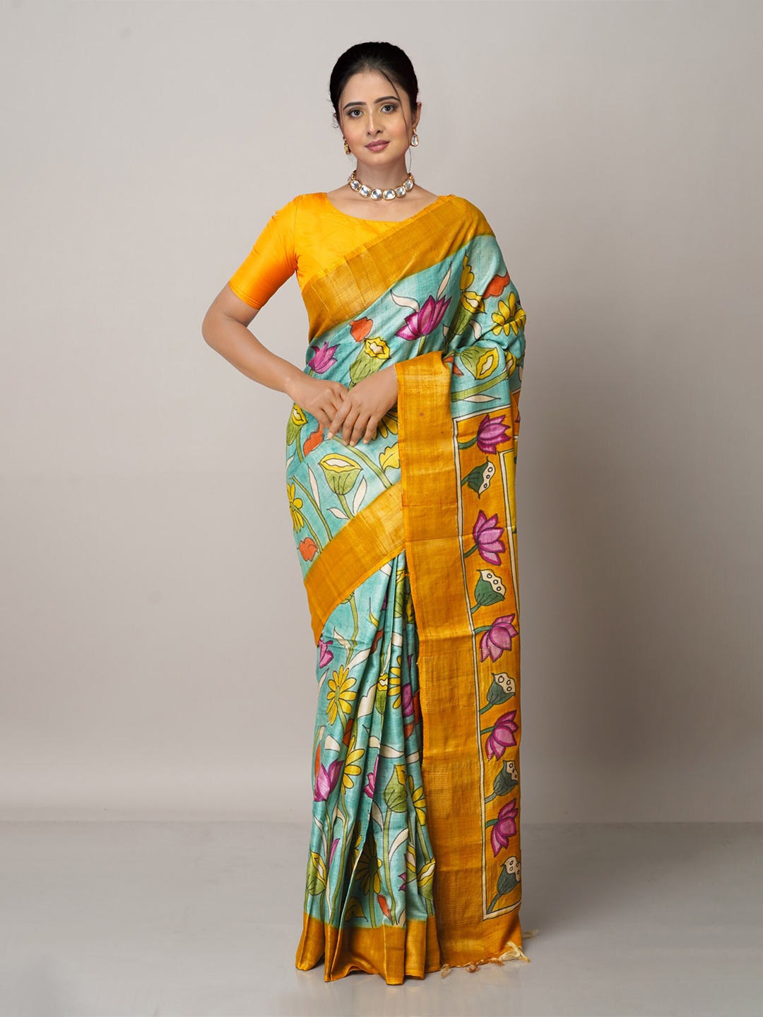 

Unnati Silks Green & Yellow Floral Zari Pure Silk Tussar Saree