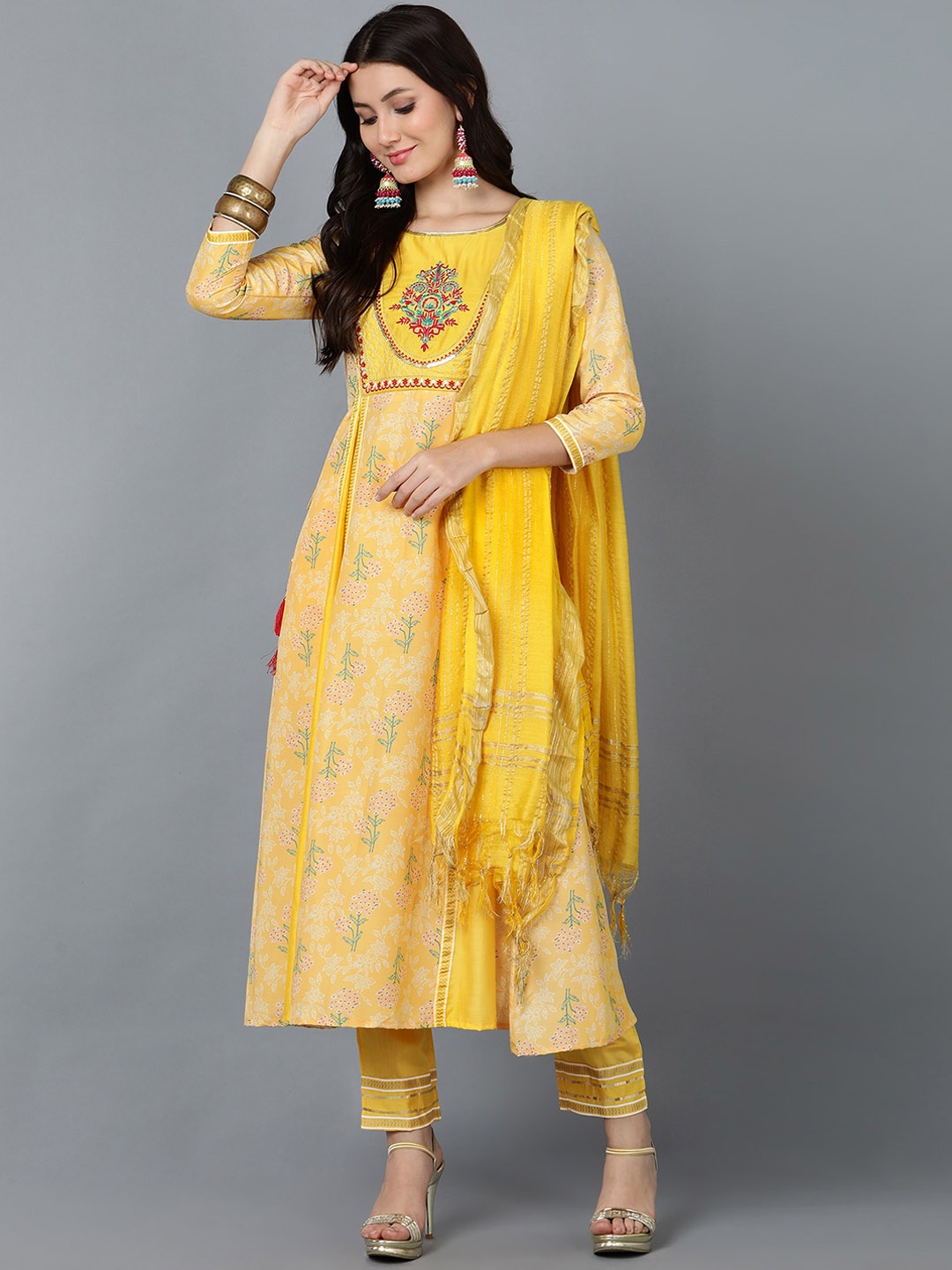 

Bani Women Yellow Pleated Chanderi Silk Kurti with Trousers & With Dupatta