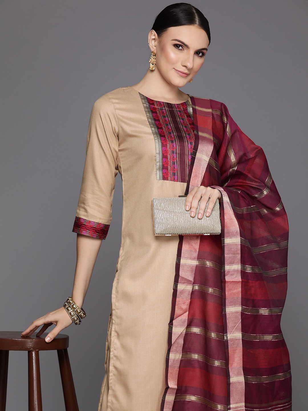 

Indo Era Women Beige Yoke Design Regular Thread Work Kurta with Palazzos & With Dupatta
