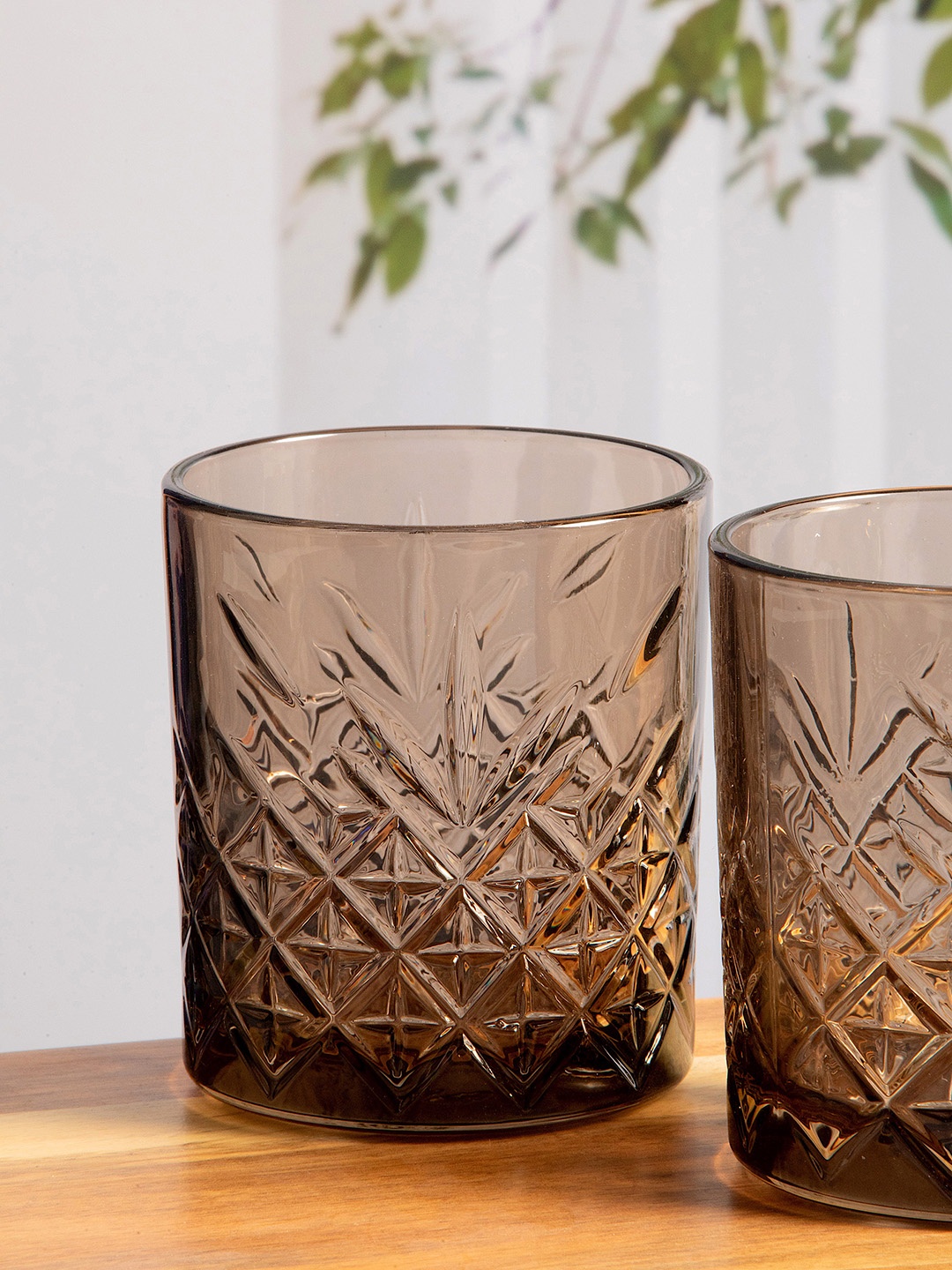 

Pasabahce Set Of 4 Maroon Transparent Textured Glass Tumblers 345 ml each