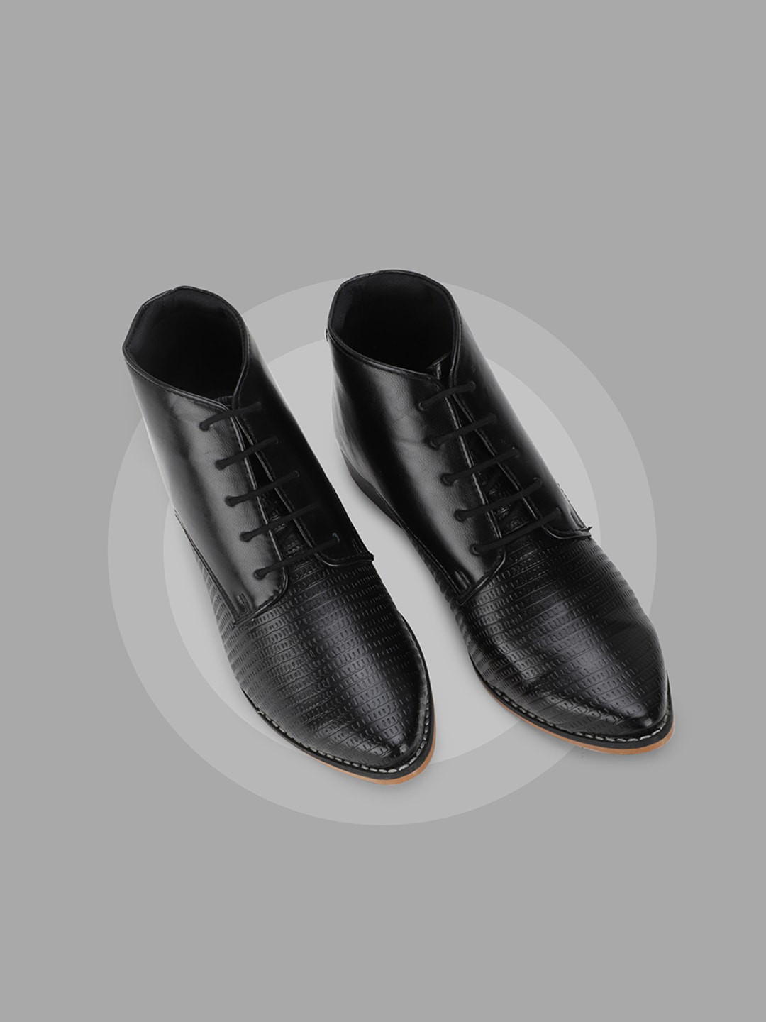 

Allen Solly Woman Black Textured PU Boots