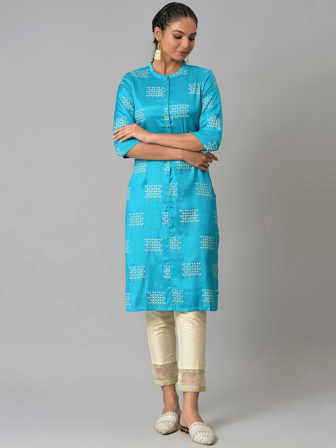 

W Women Turquoise Blue Floral Printed Kurta with Trousers