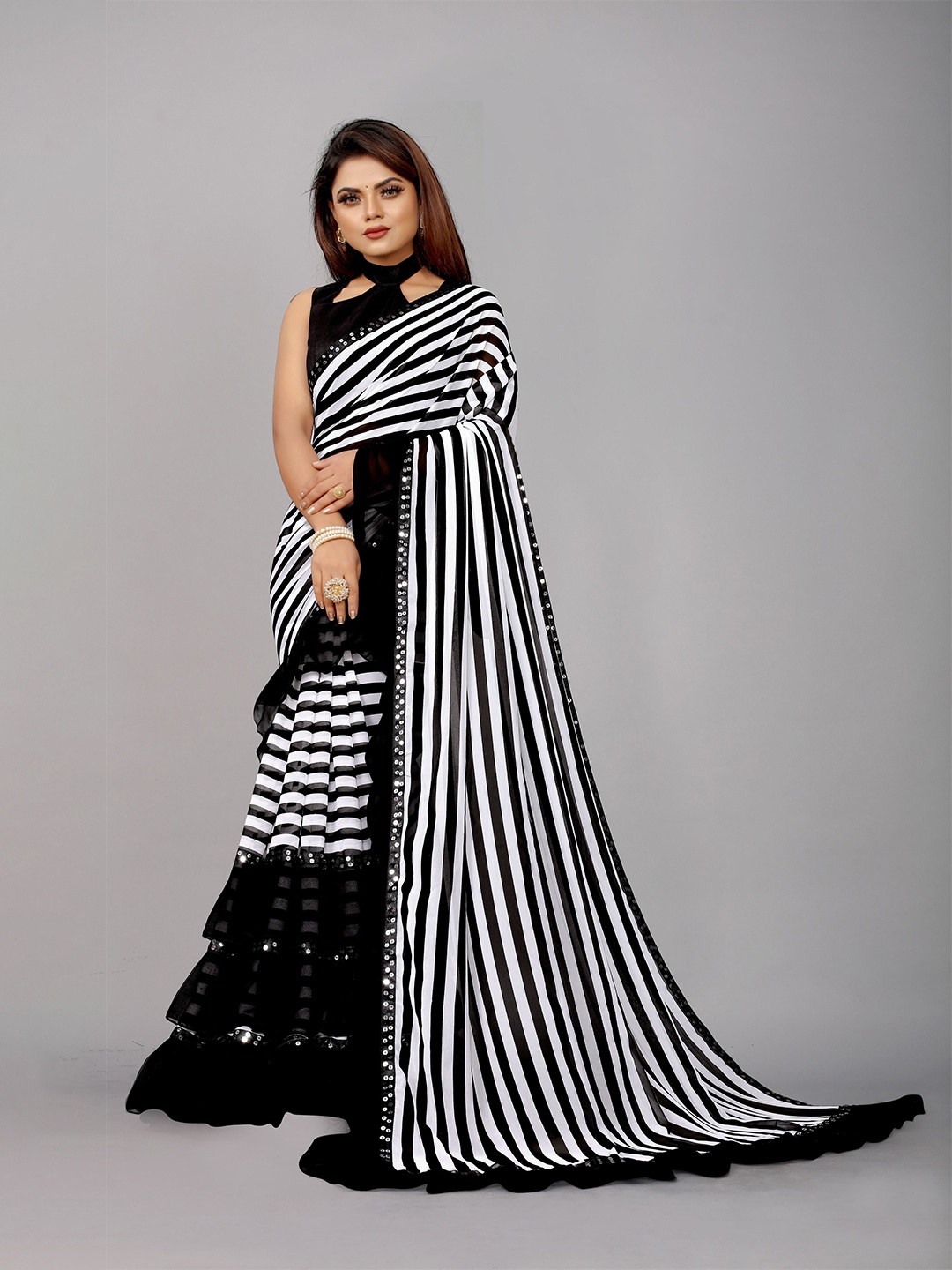 

B4ME COM Black & White Printed Striped Pure Georgette Leheriya Saree