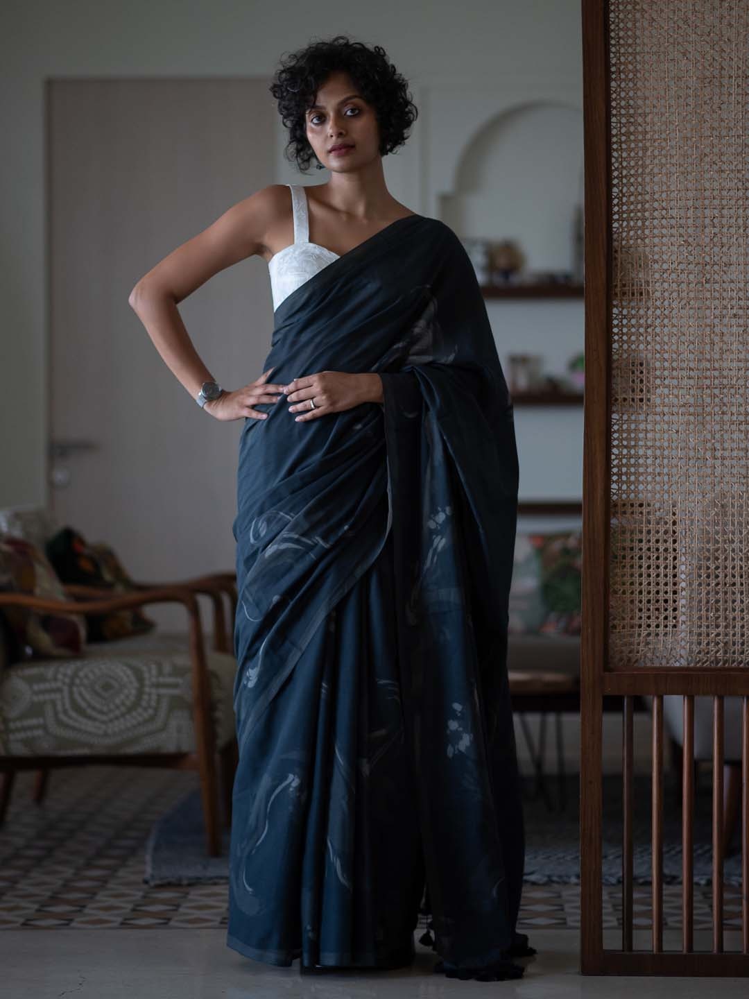 

Suta Black Abstract Modal Saree