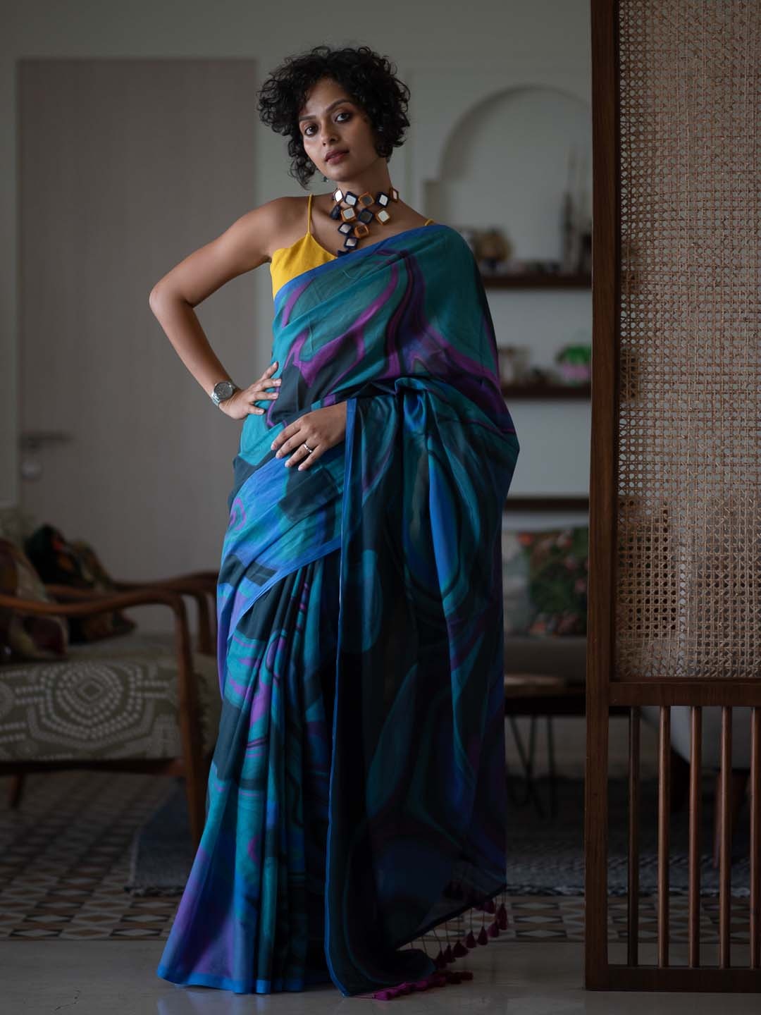 

Suta Blue & Purple Abstract Pinted Saree