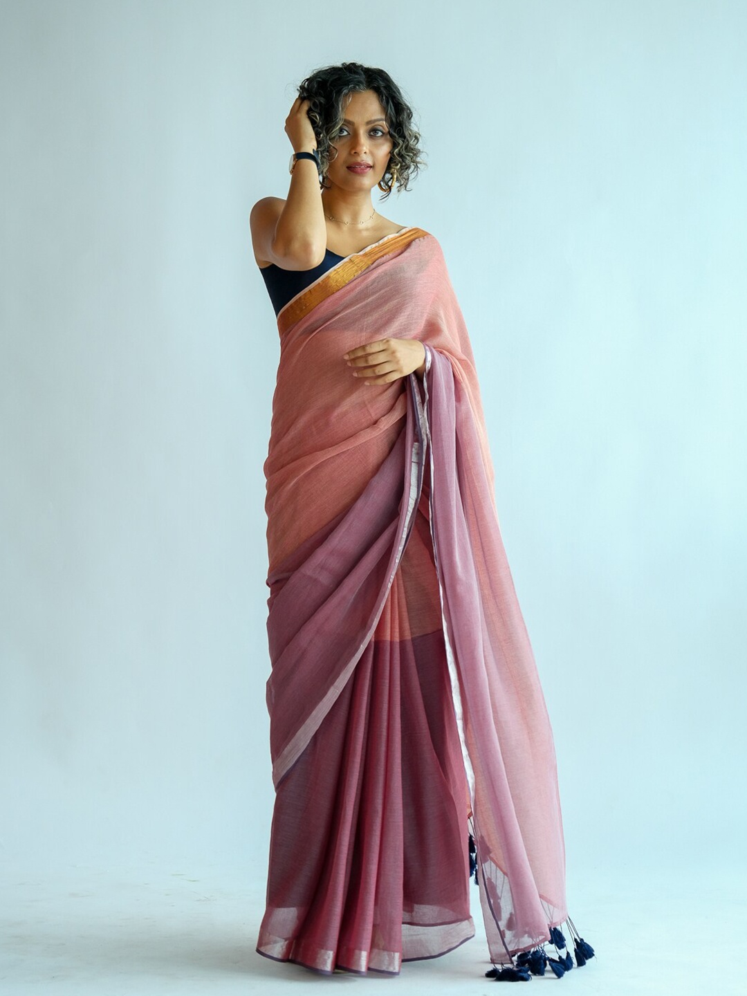 

Suta Peach-Coloured & Pink Colourblocked Zari Saree