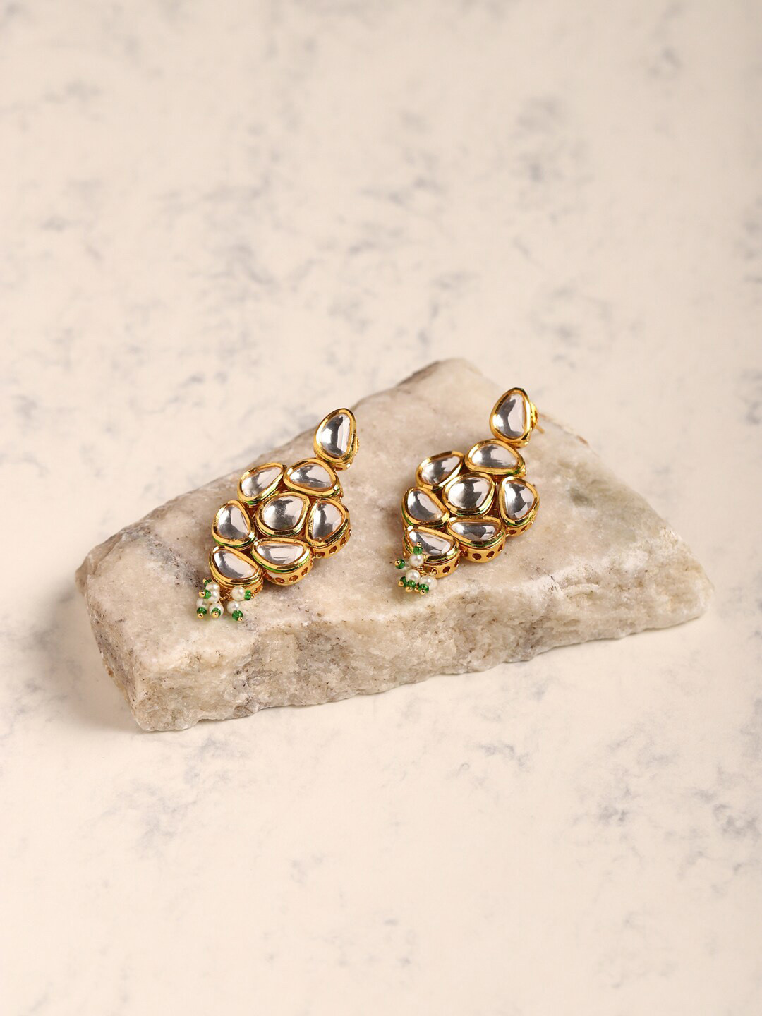 

Ruby Raang Gold Plated Kundan Studs Earrings