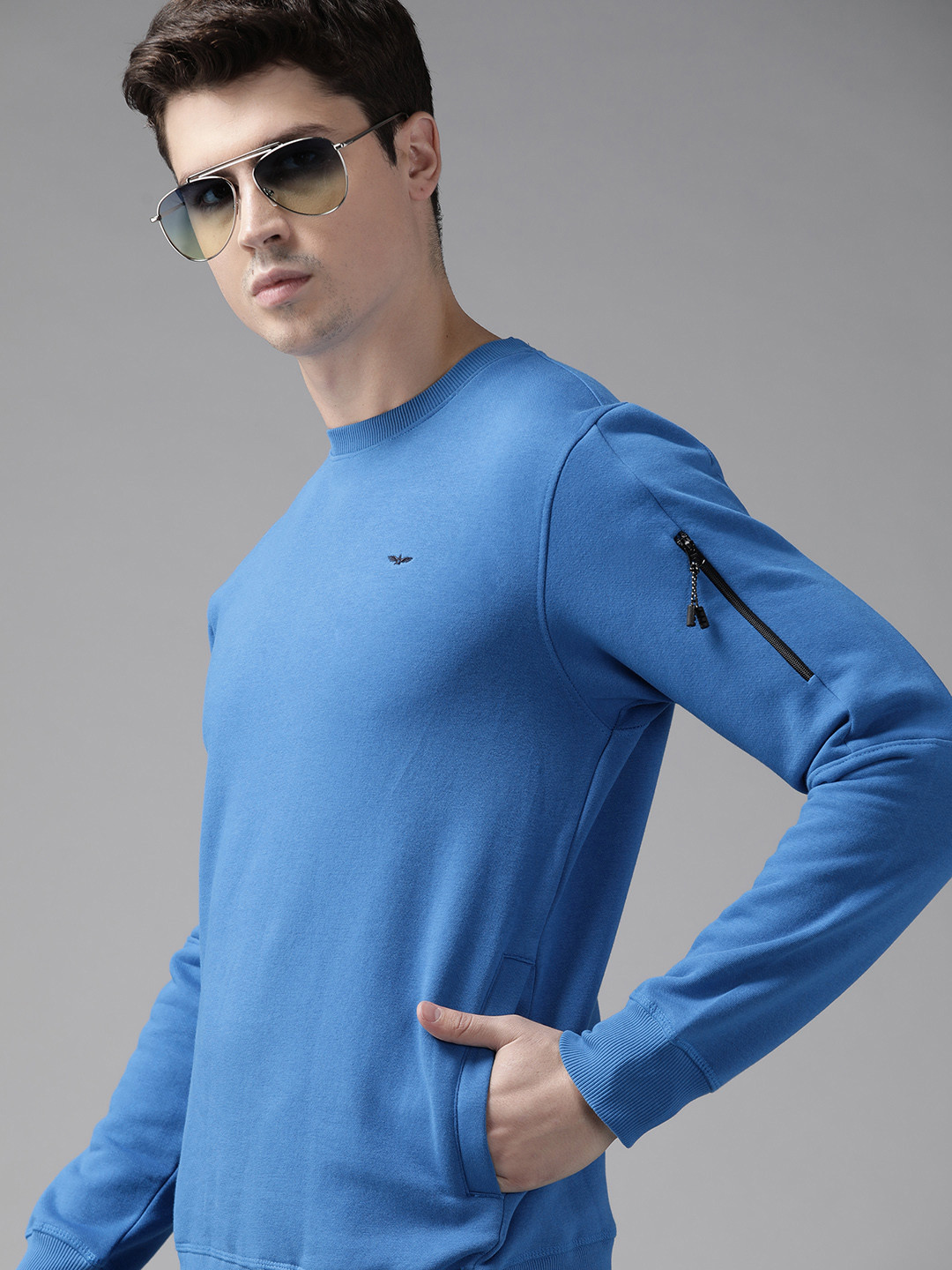 

Park Avenue Men Solid Sweatshirt, Blue