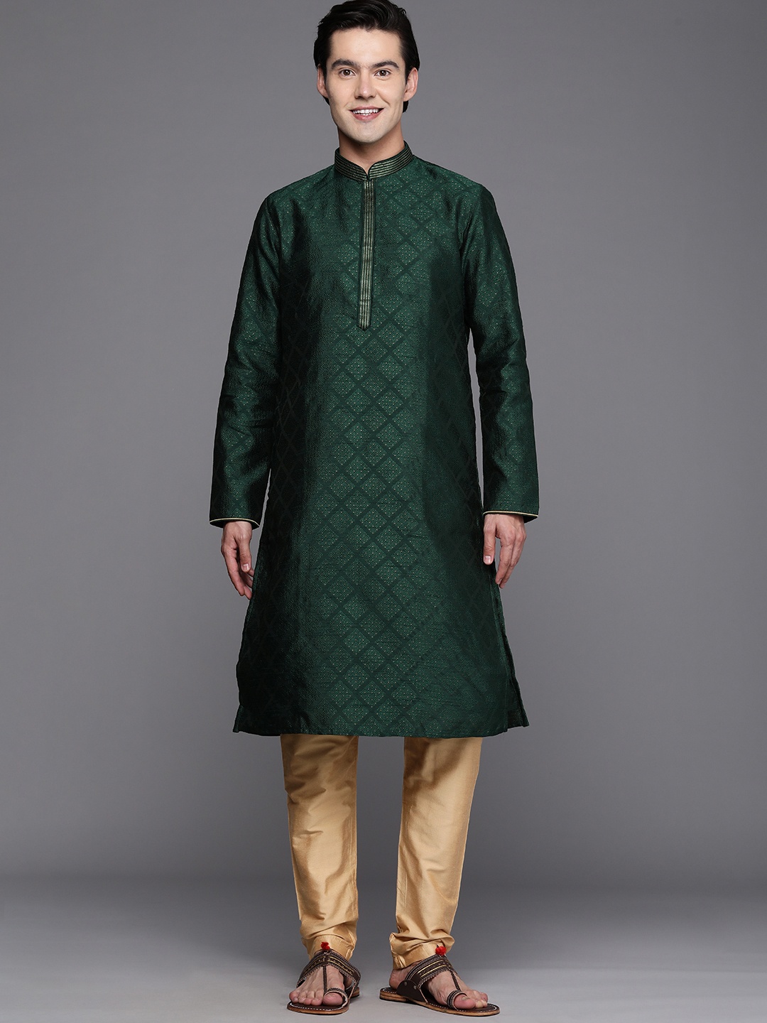 

Manyavar Men Green Ethnic Motifs Thread Work Kurta with Pyjamas