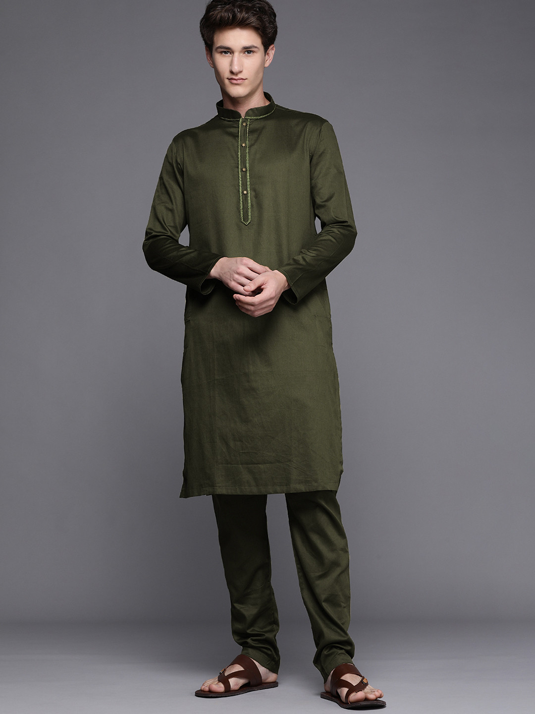 

Manyavar Men Olive Green Solid Kurta with Churidar