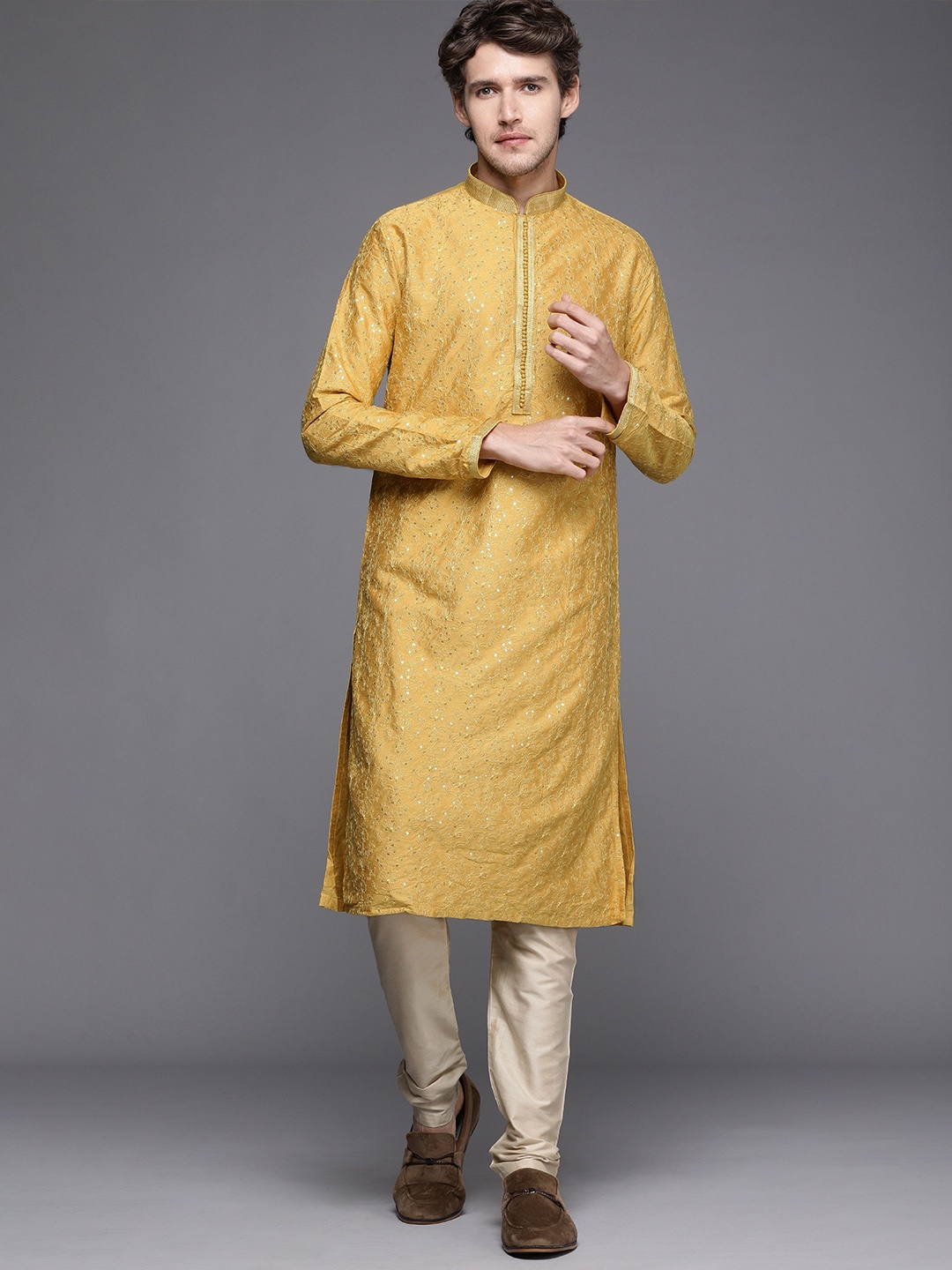 

Manyavar Men Mustard Yellow Ethnic Motifs Embroidered Sequin Work Kurta with Churidar