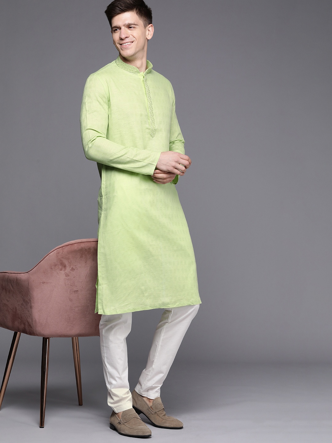 

Manyavar Men Green Solid Kurta with Churidar