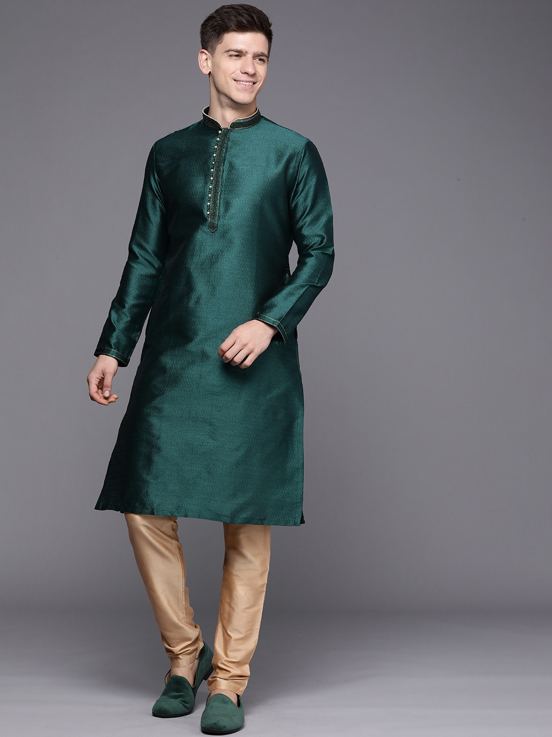 

Manyavar Men Green Ethnic Motifs Textured Kurta with Churidar