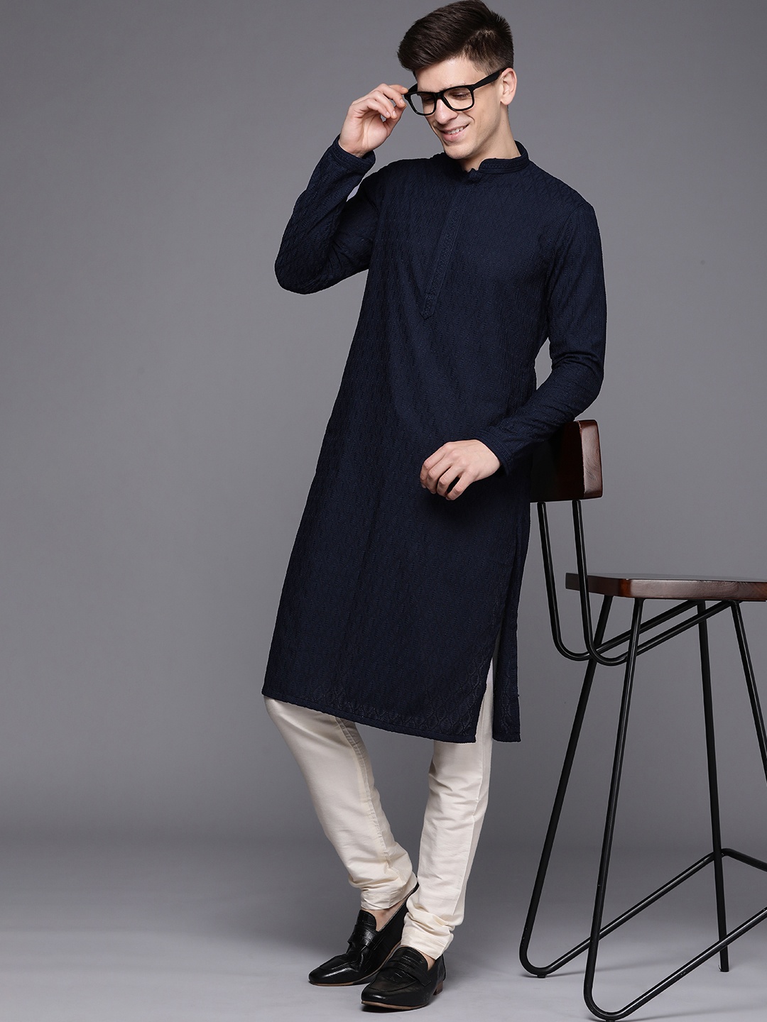 

Manyavar Men Blue Ethnic Motifs Woven Design Kurta with Churidar