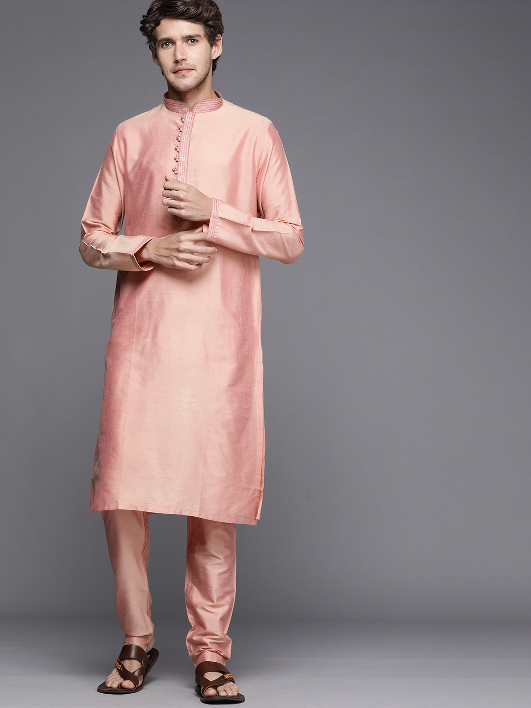 

Manyavar Men Pink Solid Kurta with Churidar