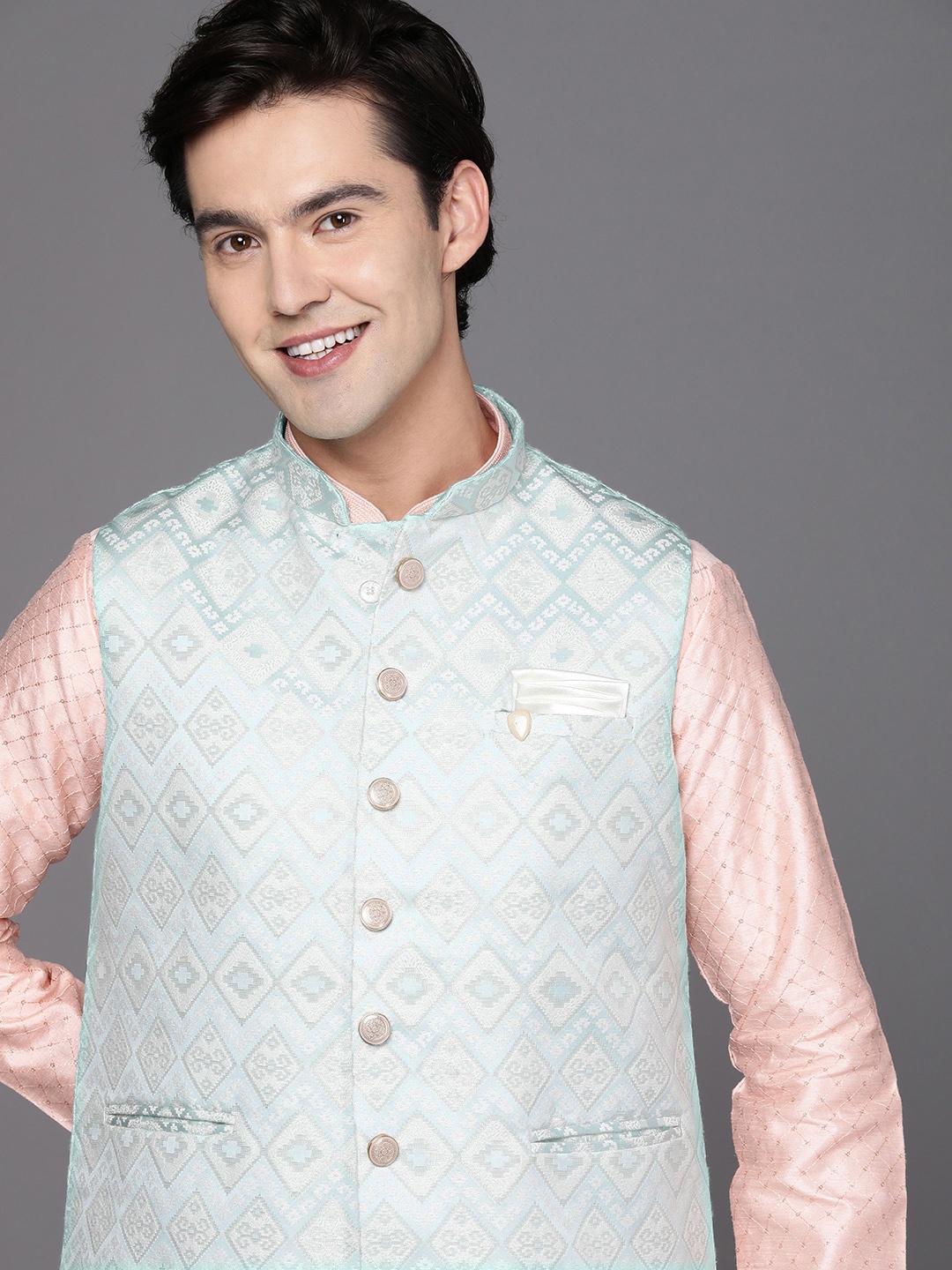 

Manyavar Blue Woven Design Nehru Jacket