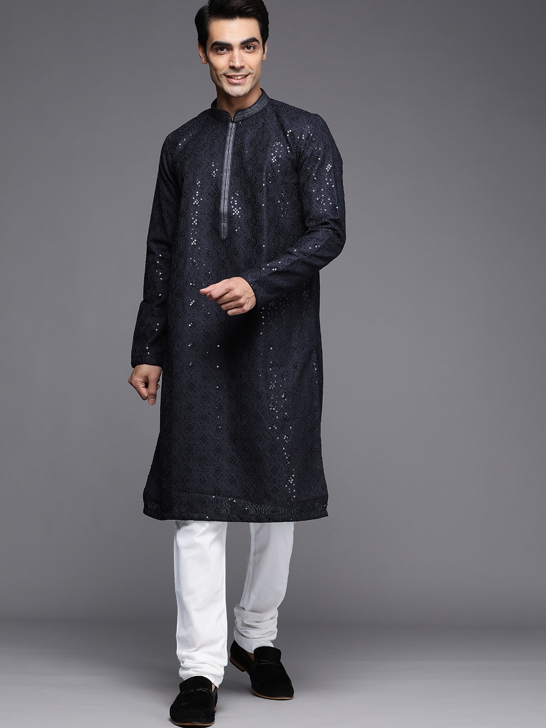 

Manyavar Men Navy Blue Ethnic Motifs Embroidered Sequinned Silk Georgette Kurta with Churidar