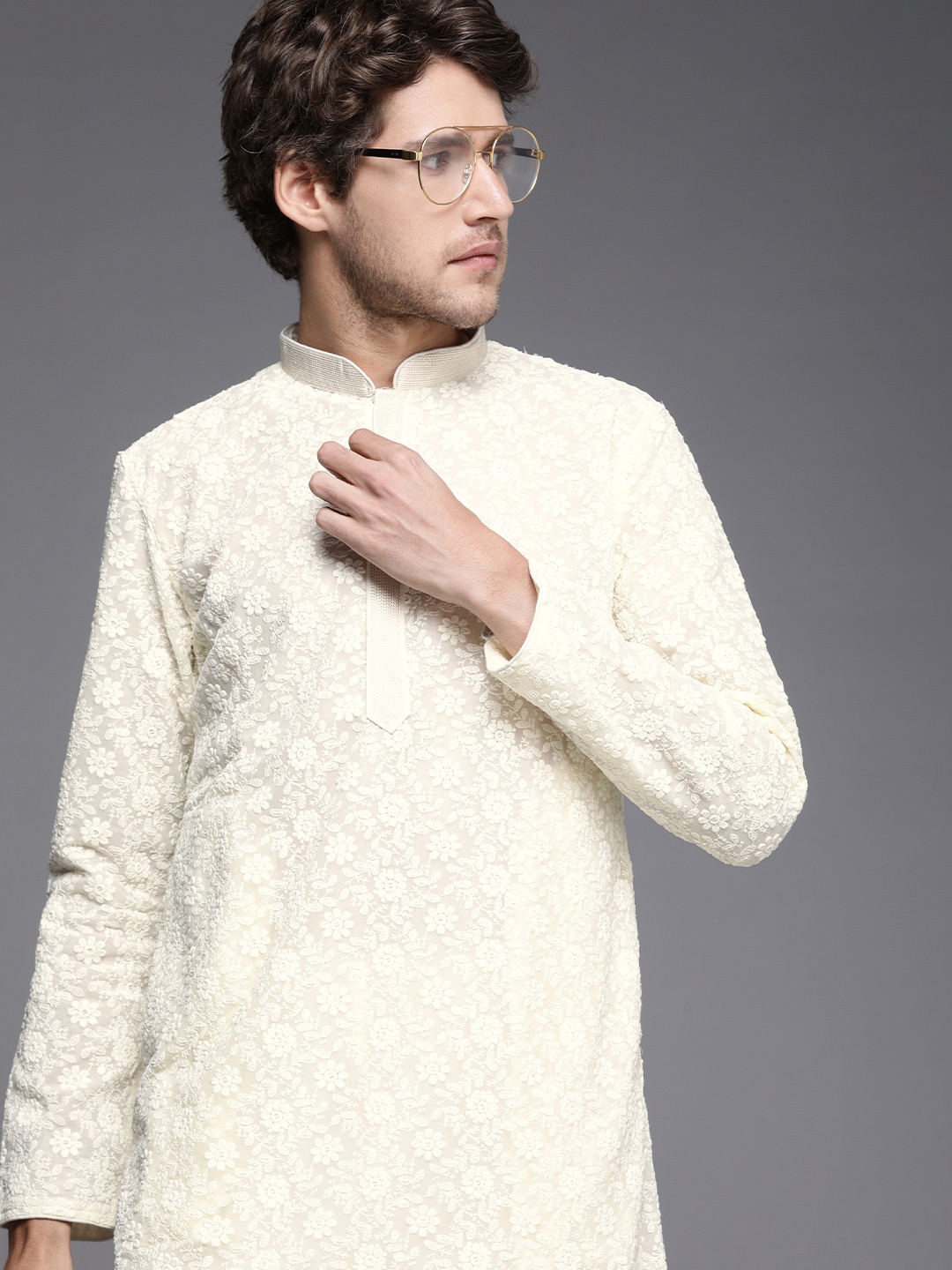 

Manyavar Men Cream-Coloured Ethnic Motifs Embroidered Sequinned Kurta with Churidar