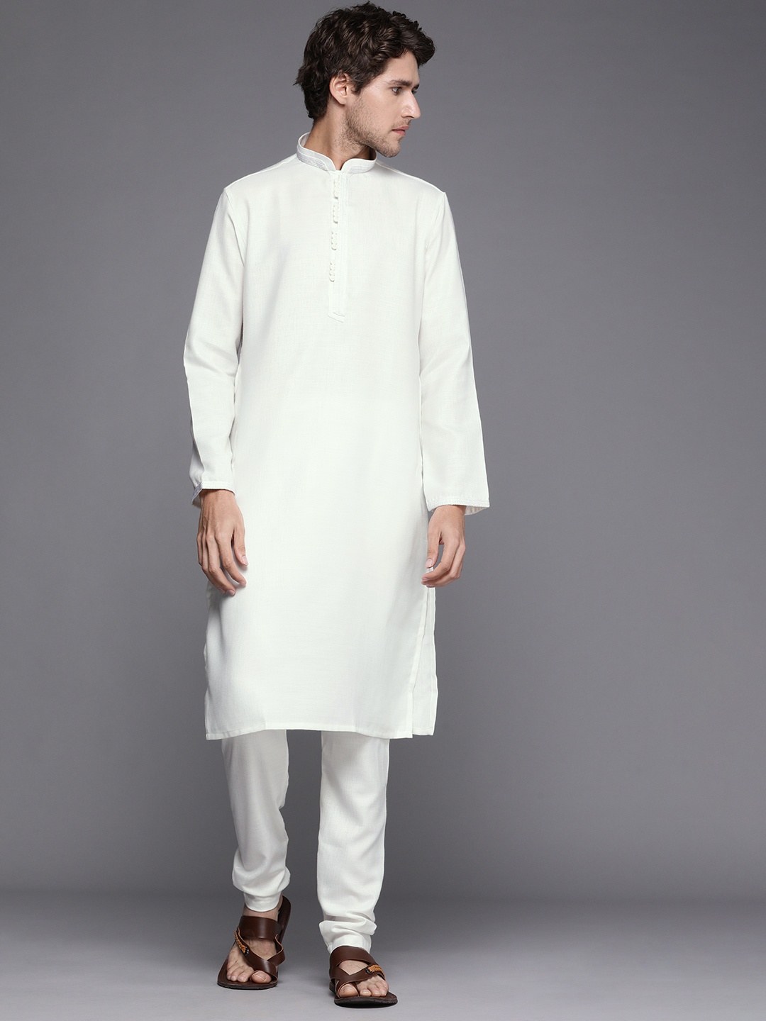 

Manyavar Men White Solid Kurta with Churidar