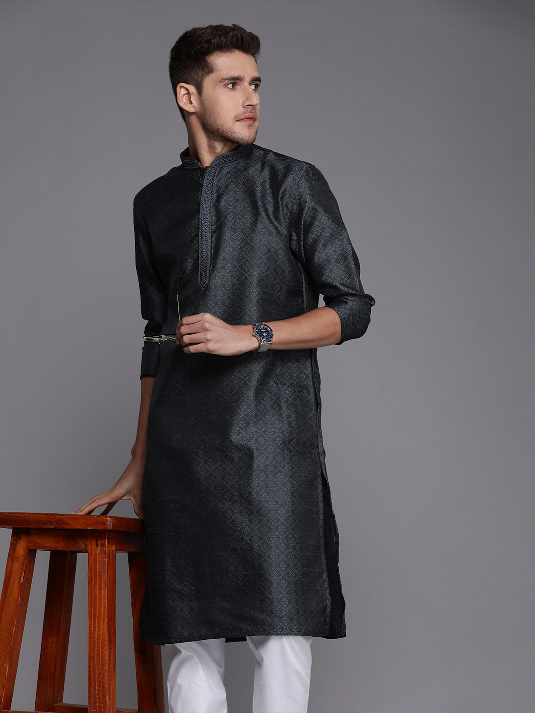 

Manyavar Men Charcoal Ethnic Motifs Thread Work Kurta with Churidar