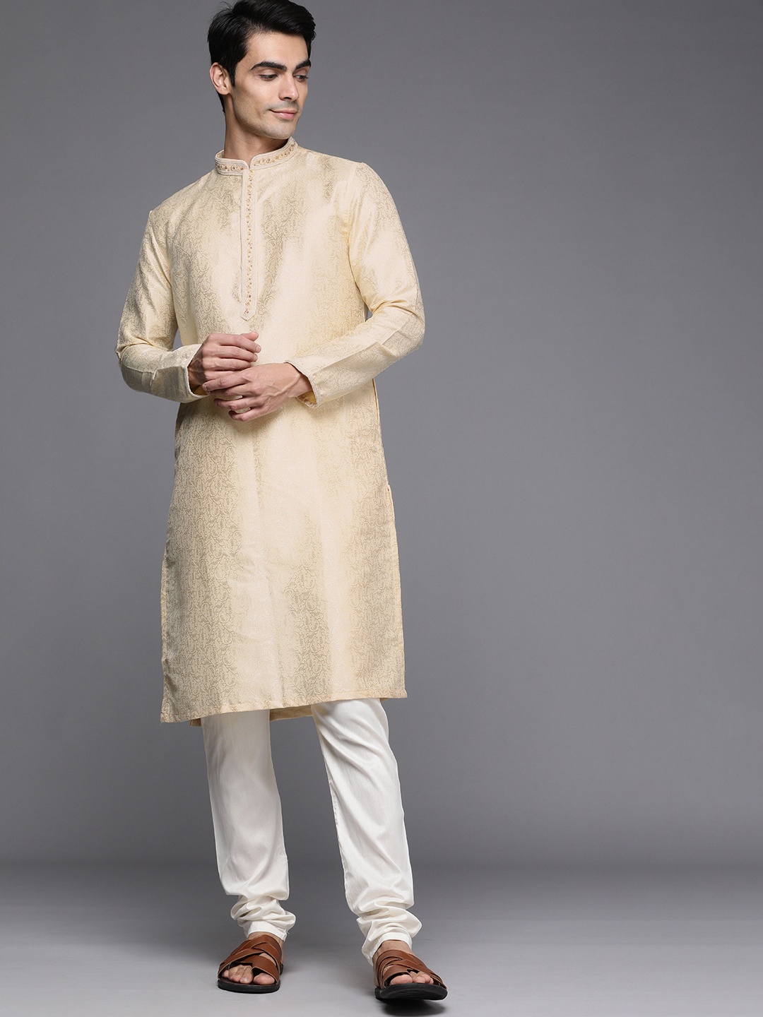 

Manyavar Men Cream-Coloured Thread Work Kurta with Churidar