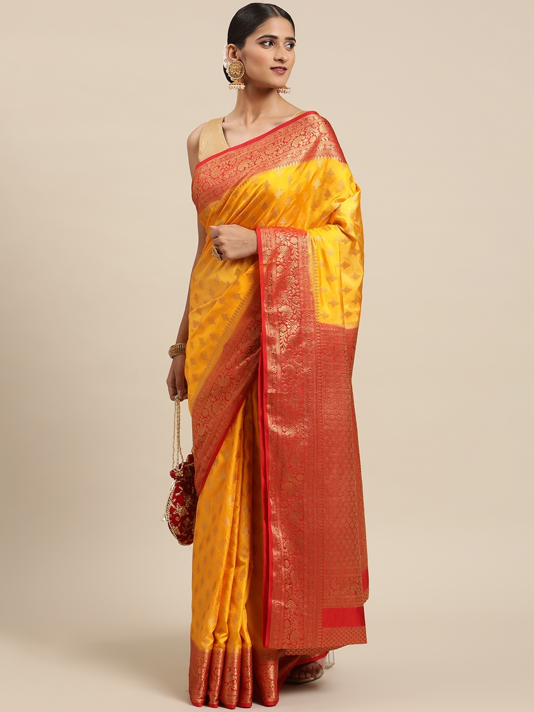 

Mitera Mustard & Golden Woven Design Zari Art Silk Tussar Saree