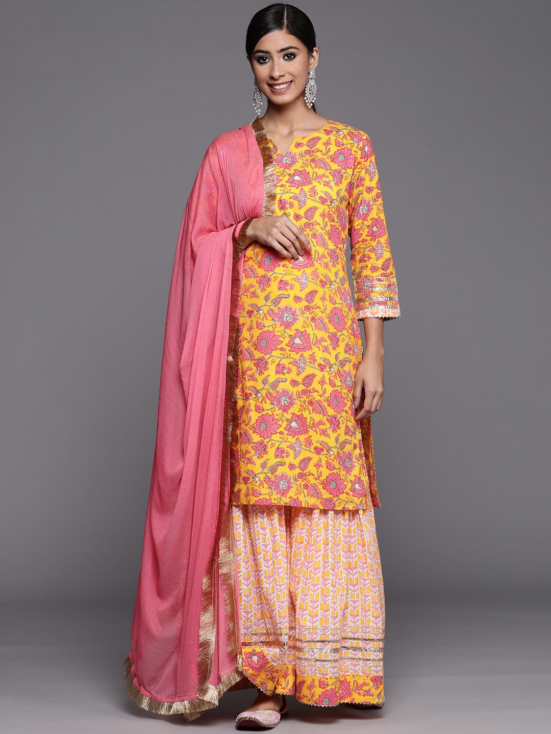 

Varanga Women Yellow Floral Printed Pure Cotton Kurta with Sharara & With Dupatta