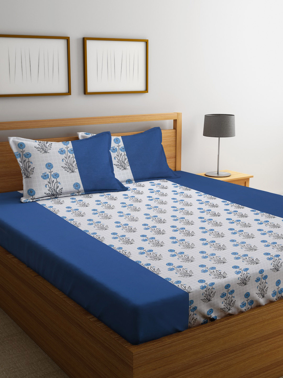 

Rajasthan Decor White & Blue 180 TC Floral Cotton King Bedsheet with 2 Pillow Covers