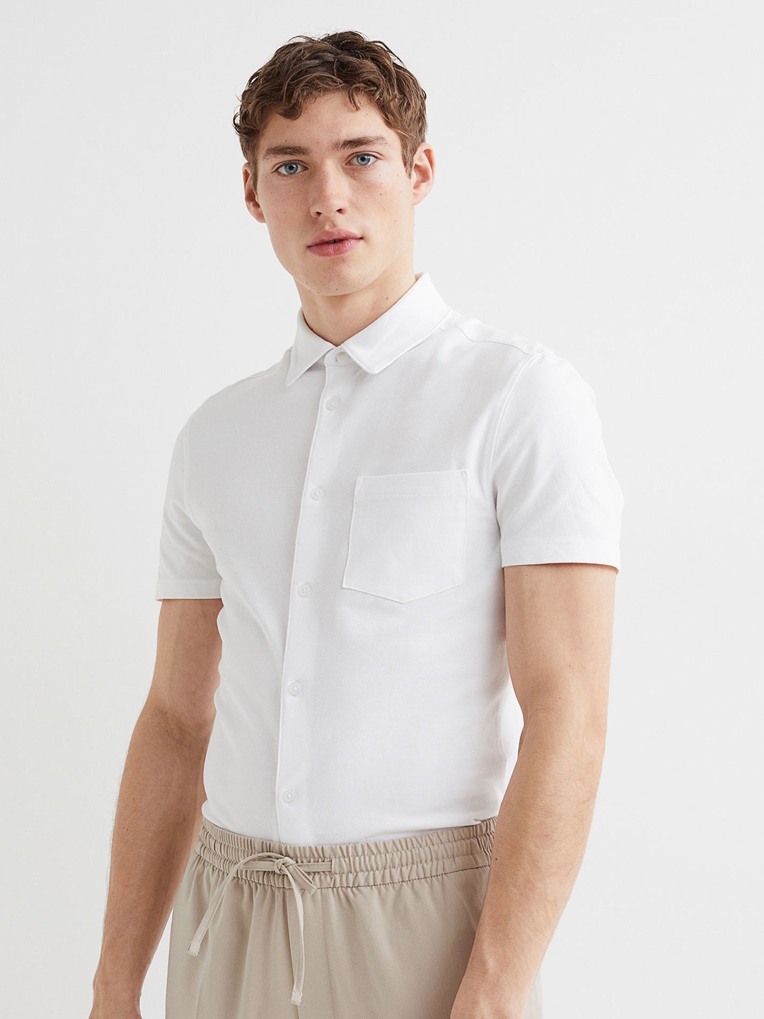 

H&M White Muscle Fit Cotton Piqu Top