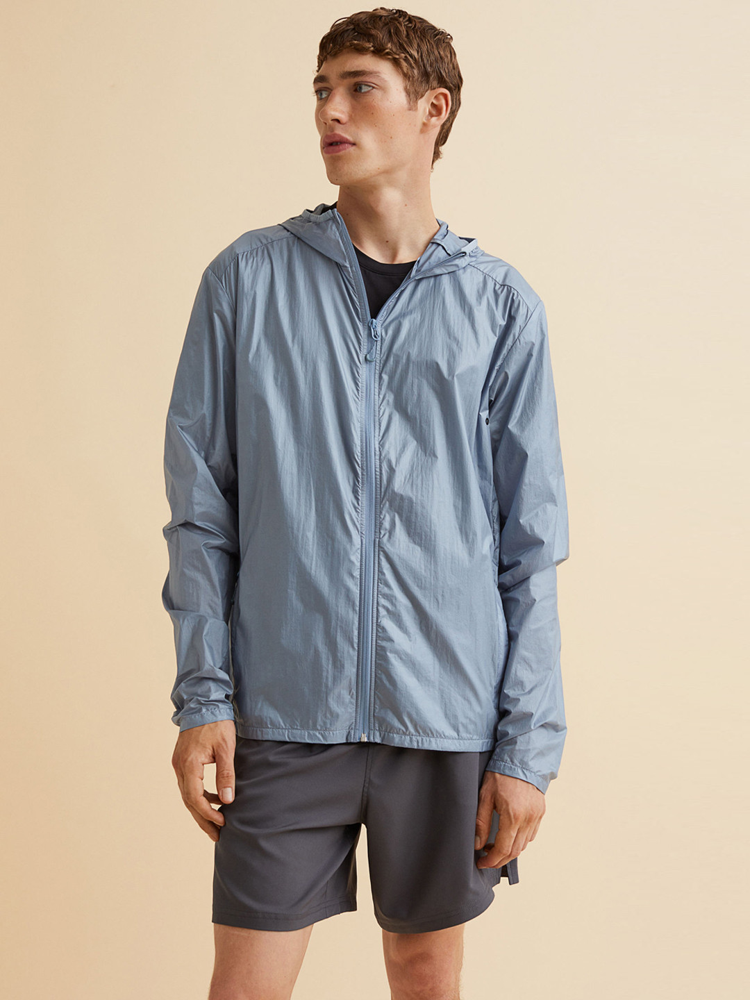 

H&M Men Blue Solid Regular Fit Lightweight Running Jacket