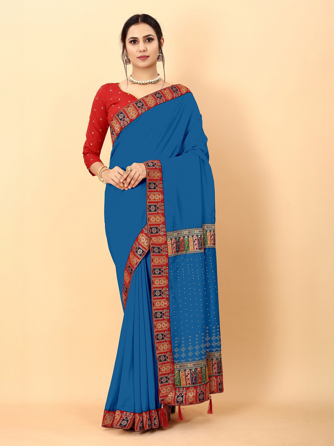 

Hinayat Fashion Blue & Red Printed Ethnic Motifs Beads And Stones Maheshwari Saree