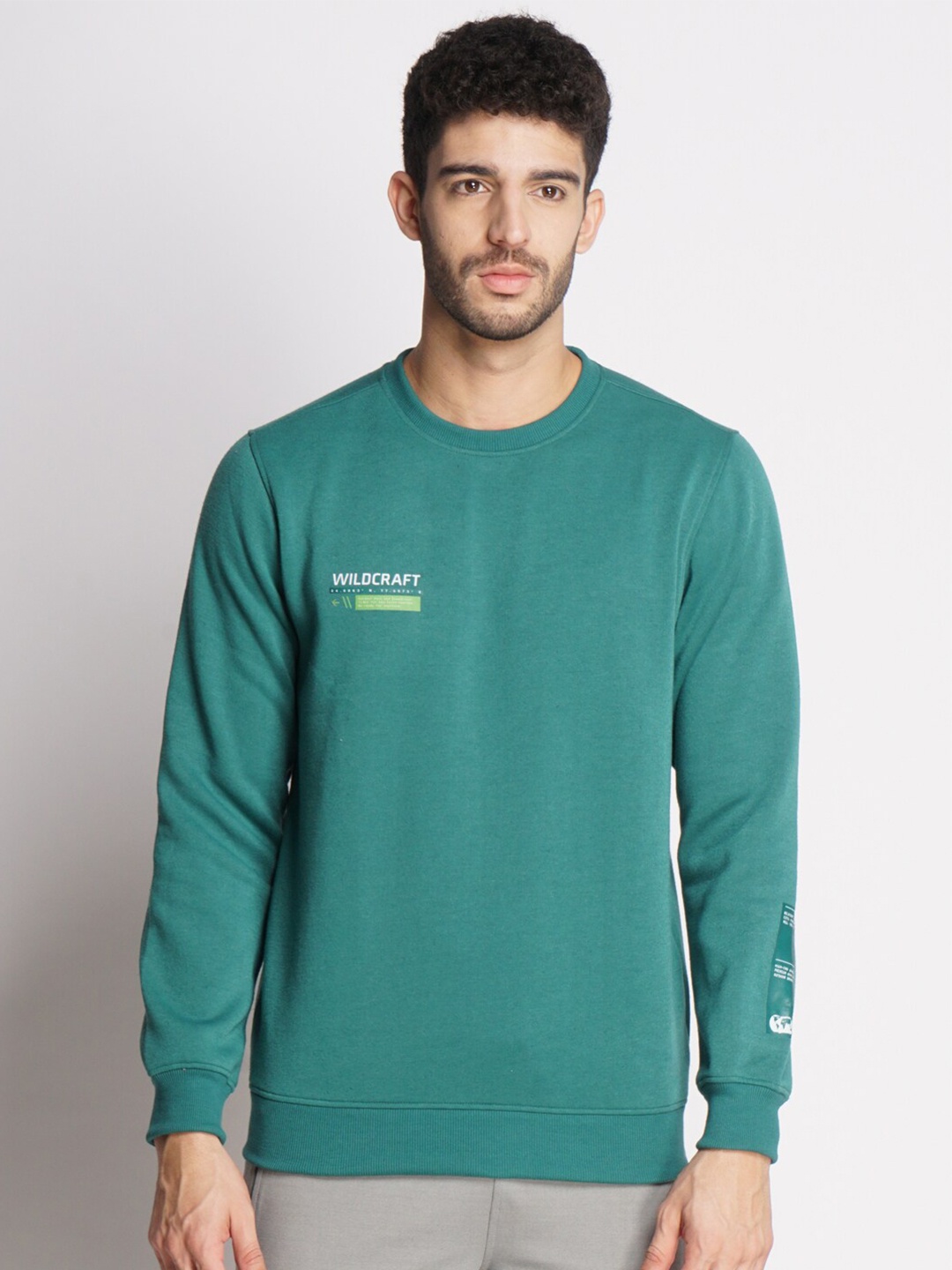 

Wildcraft Men Green Solid Sweatshirt