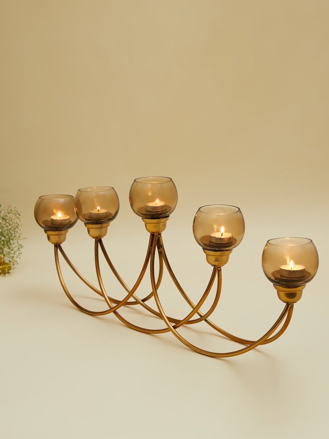 

Home Centre Gold-Toned Glass Candles Holder With Iron Base