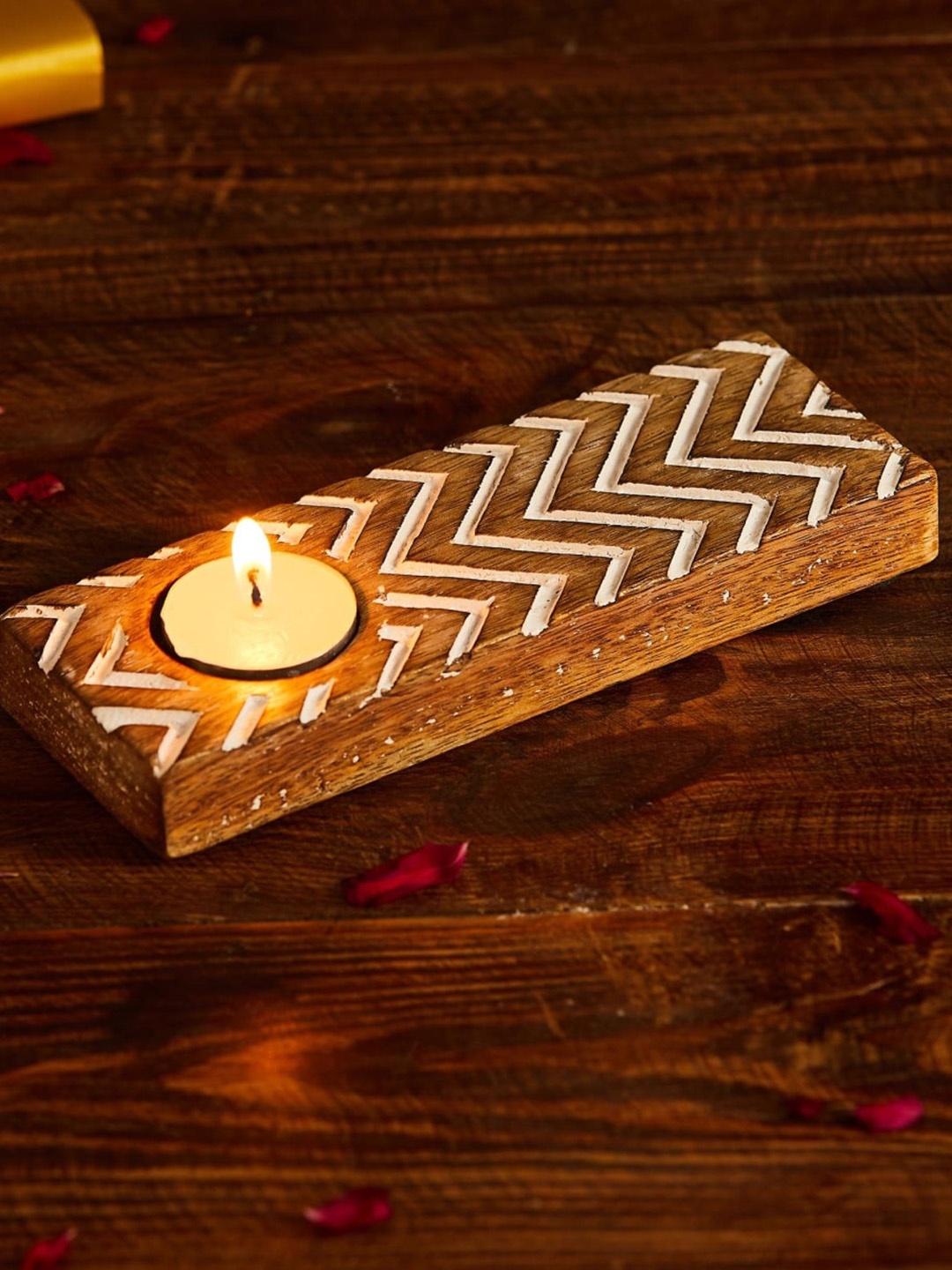 

Home Centre Brown Solid Chevron Mango Wood Candle Holder