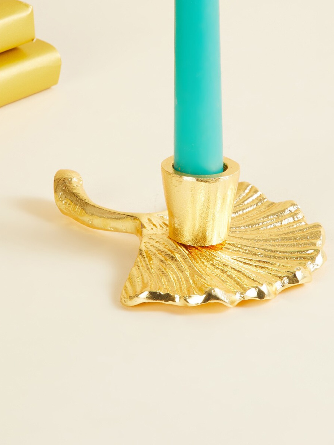 

Home Centre Gold-Toned Textured Metal Leaf Candle Holder