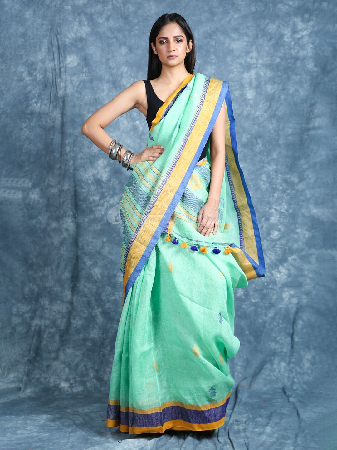 

Arhi Green & Blue Woven Design Zari Pure Linen Saree