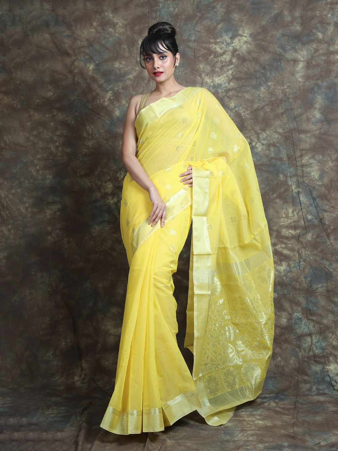 

Arhi Yellow & Silver-Toned Ethnic Motifs Zari Silk Cotton Jamdani Saree