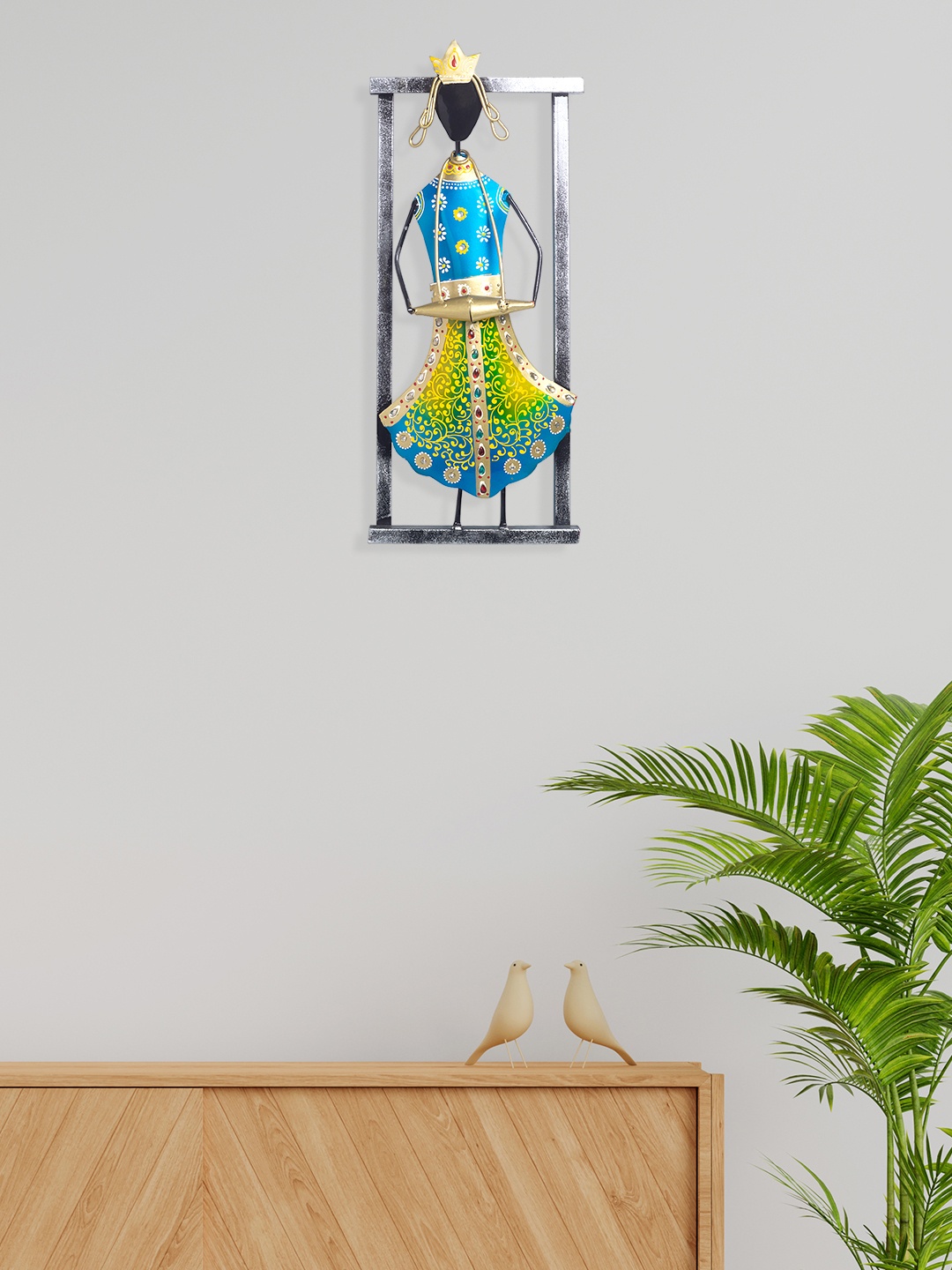 

Golden Peacock Blue & Green Embellished Abhla Bharat Dholak Playing Musician Wall Decor