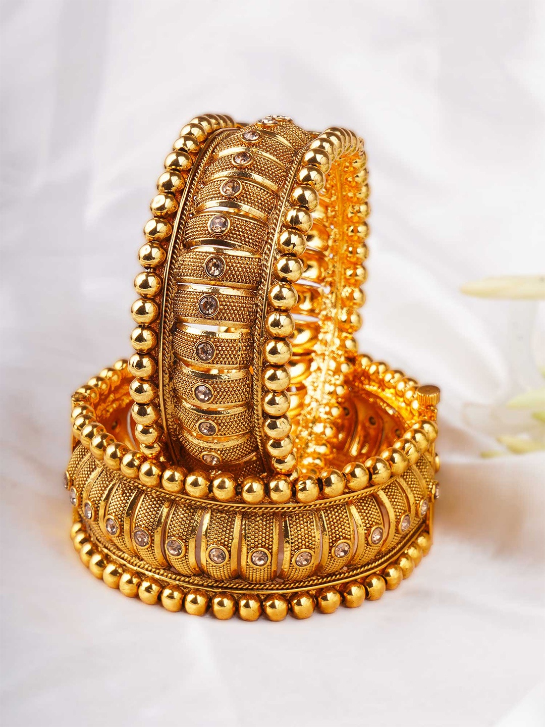

Adwitiya Collection Set Of 2 Gold-Plated Gold-Toned Stone Studded Antique Bangle
