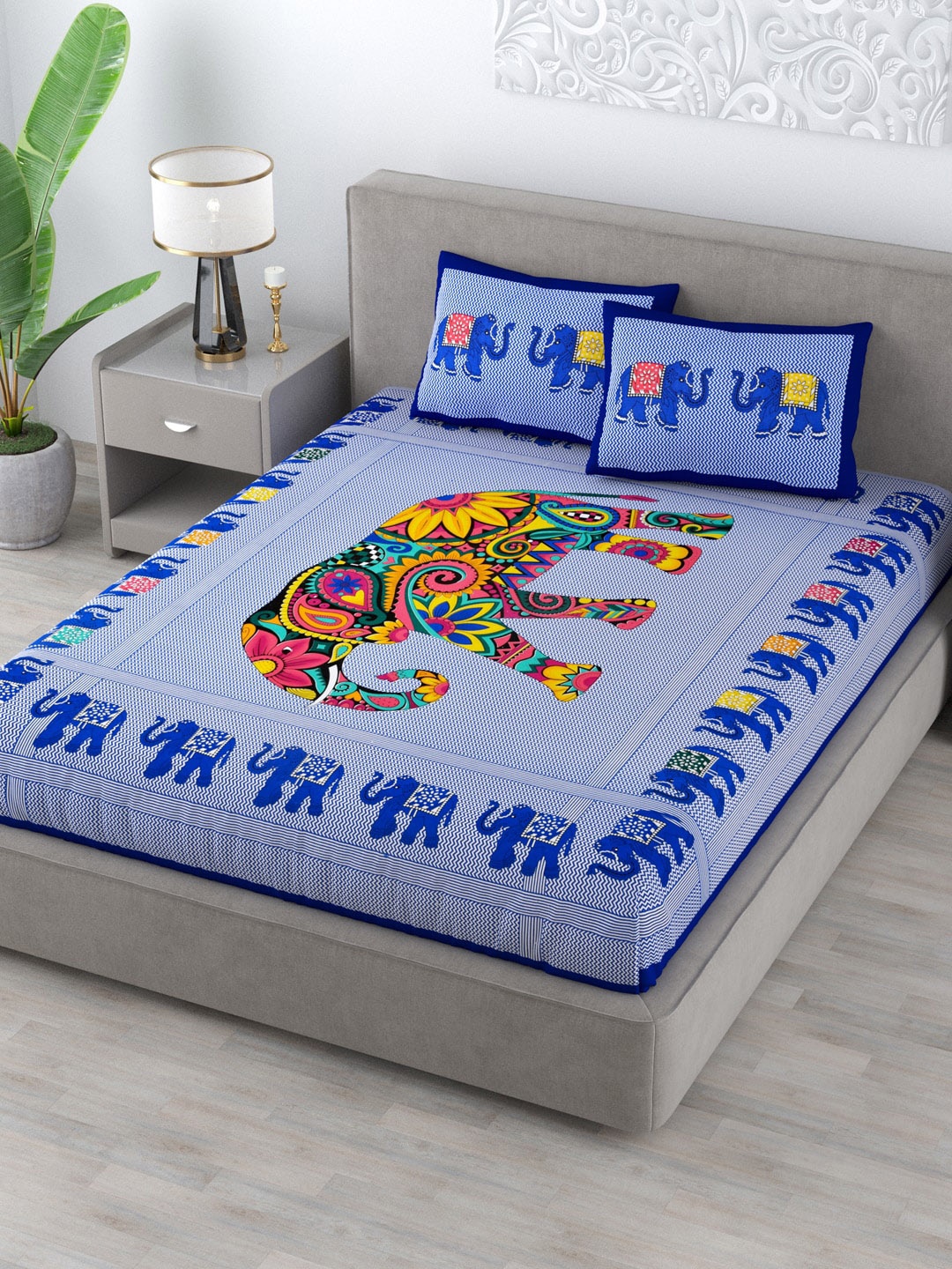 

Varde Blue & Yellow Ethnic Motifs 120 TC Cotton Queen Bedsheet with 2 Pillow Covers