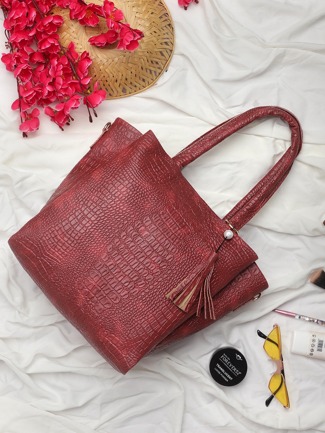 

Bag Pepper Maroon Textured Tasselled Shoulder Bag