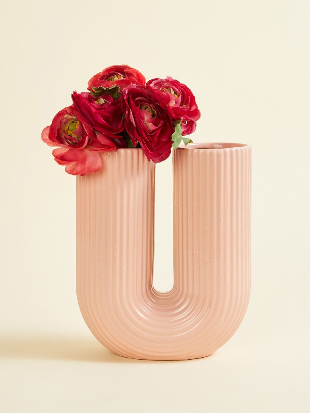 

Home Centre Pink Textured U Shaped Vase