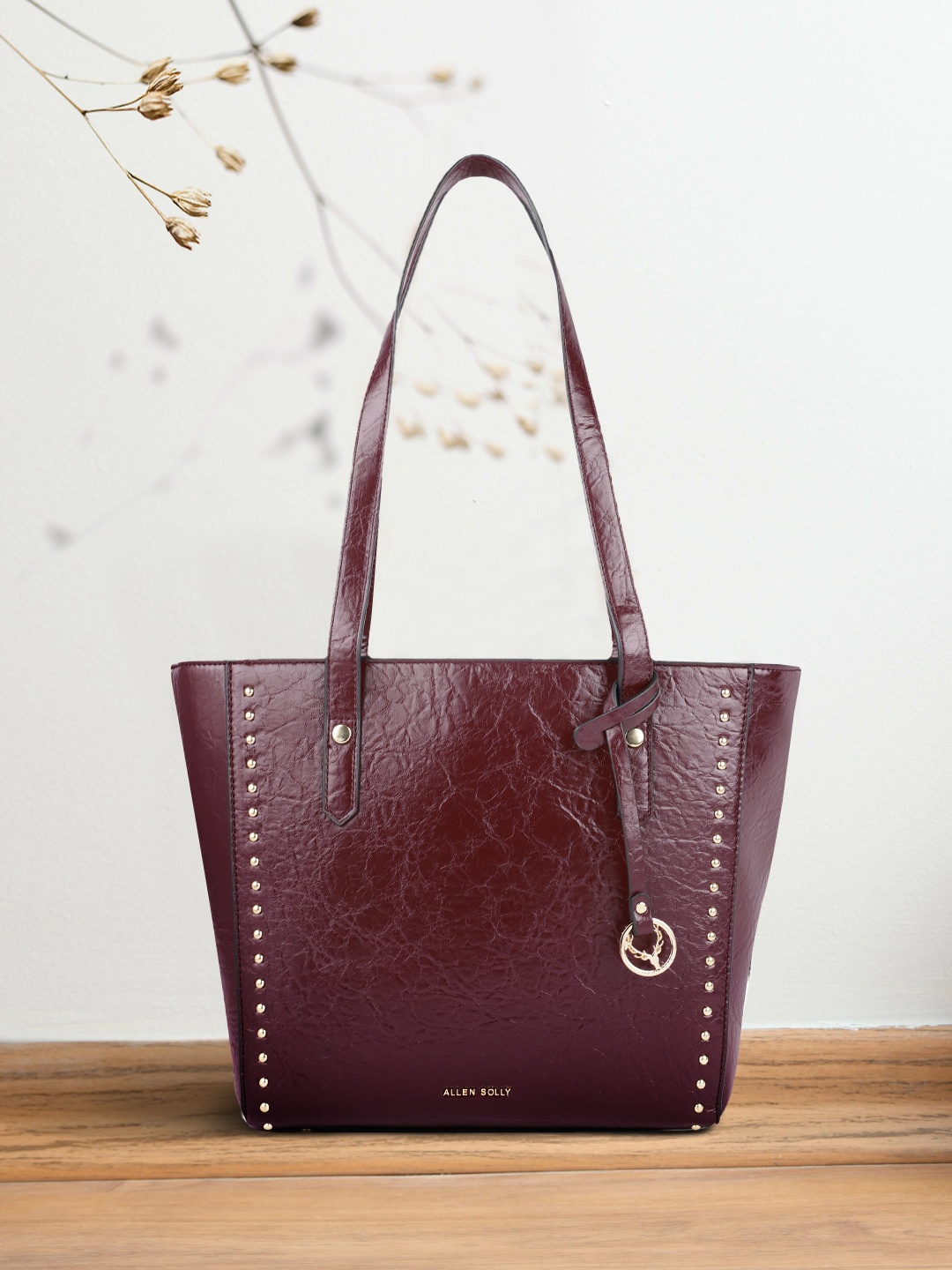 

Allen Solly Burgundy Textured with Studs Shoulder Bag