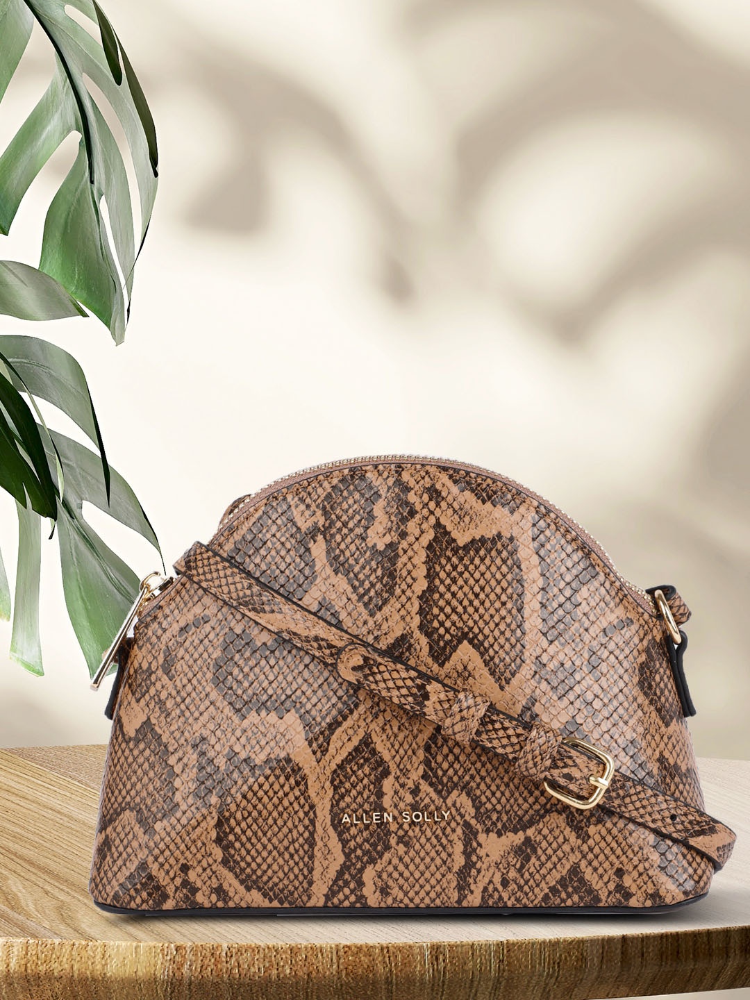 

Allen Solly Brown Snake Print Sling Bag
